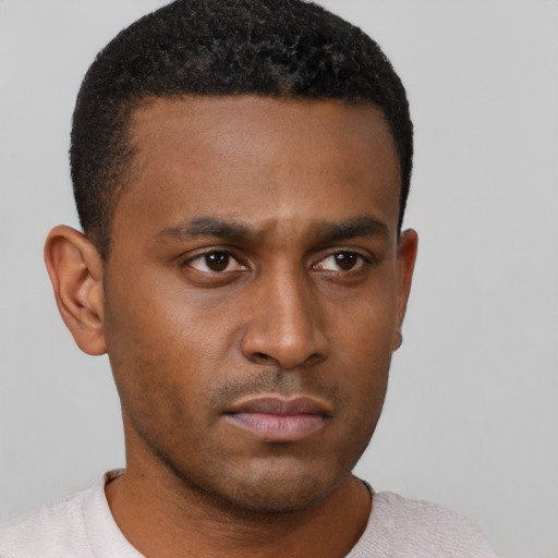 Neutral latino young-adult male with short  brown hair and brown eyes