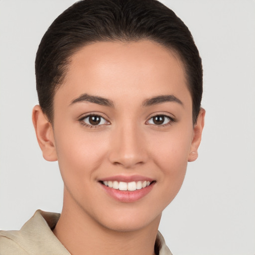 Joyful white young-adult female with short  brown hair and brown eyes