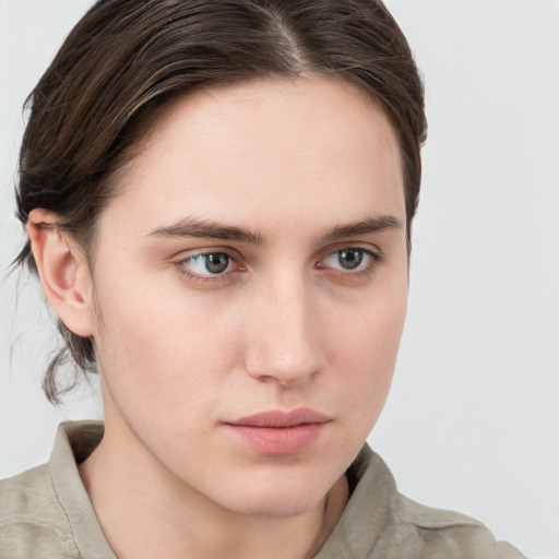 Neutral white young-adult female with medium  brown hair and grey eyes