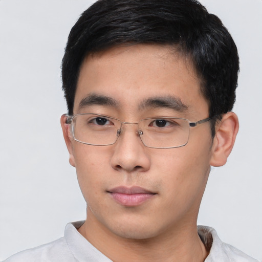 Neutral white young-adult male with short  black hair and brown eyes