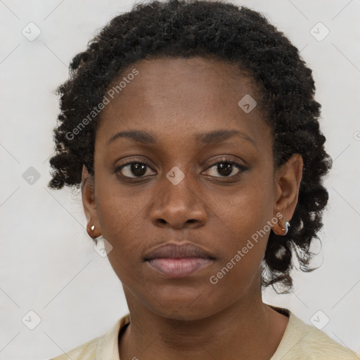 Neutral black young-adult female with short  brown hair and brown eyes