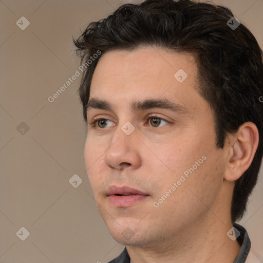 Neutral white young-adult male with short  black hair and brown eyes