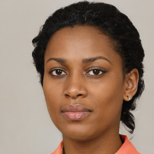 Neutral black young-adult female with short  black hair and brown eyes