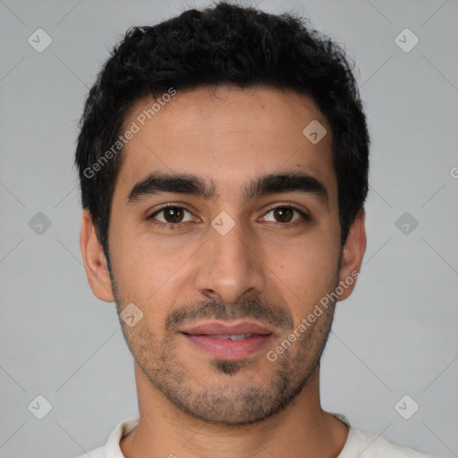 Joyful latino young-adult male with short  black hair and brown eyes