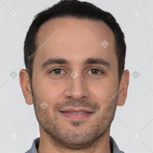 Joyful white young-adult male with short  brown hair and brown eyes