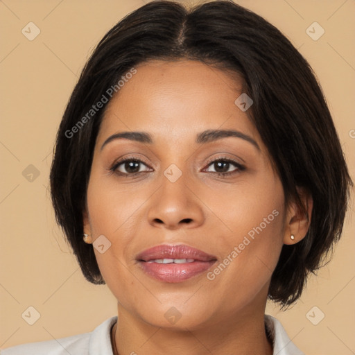 Joyful latino young-adult female with medium  brown hair and brown eyes