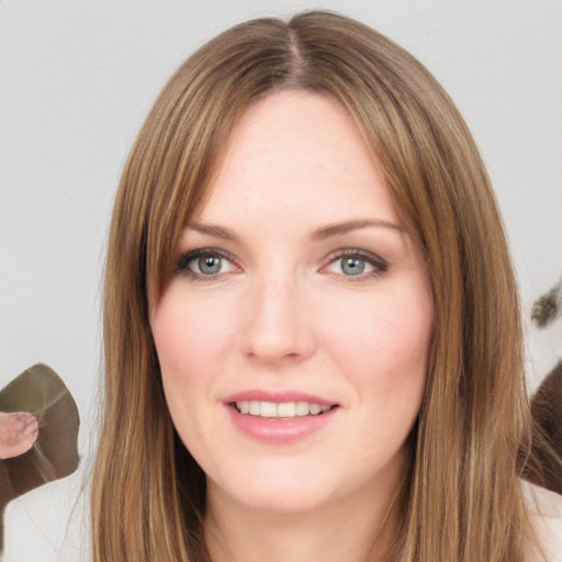 Joyful white young-adult female with long  brown hair and green eyes