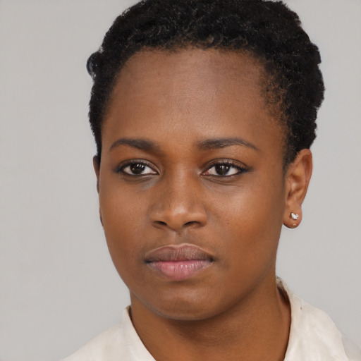 Neutral black young-adult female with short  black hair and brown eyes