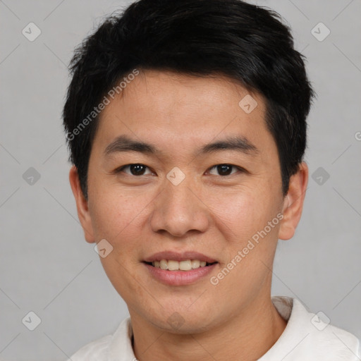 Joyful white young-adult male with short  black hair and brown eyes