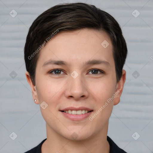 Joyful white young-adult female with short  brown hair and brown eyes