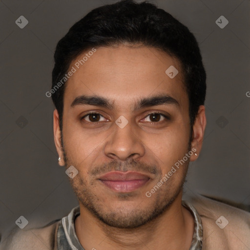 Joyful latino young-adult male with short  brown hair and brown eyes