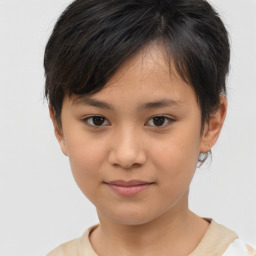 Joyful asian child female with short  brown hair and brown eyes