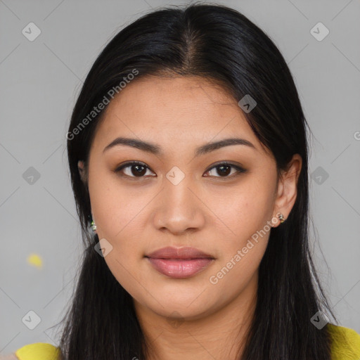 Joyful asian young-adult female with long  brown hair and brown eyes