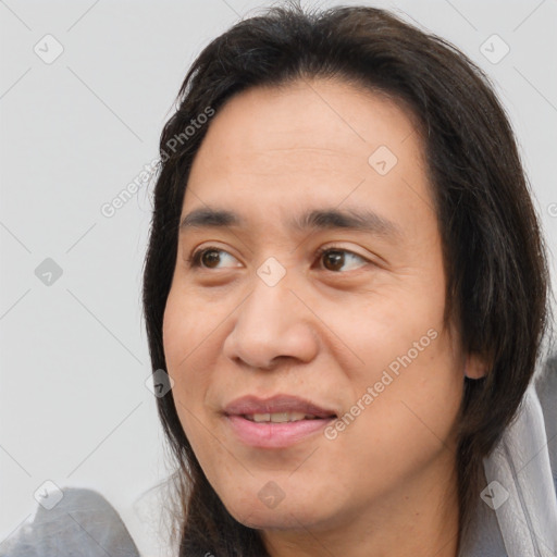 Joyful white adult male with medium  brown hair and brown eyes