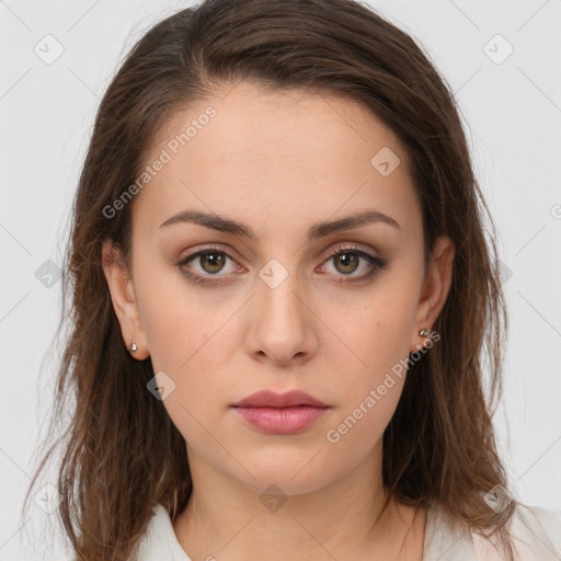 Neutral white young-adult female with long  brown hair and brown eyes