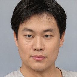 Neutral asian young-adult male with short  black hair and brown eyes