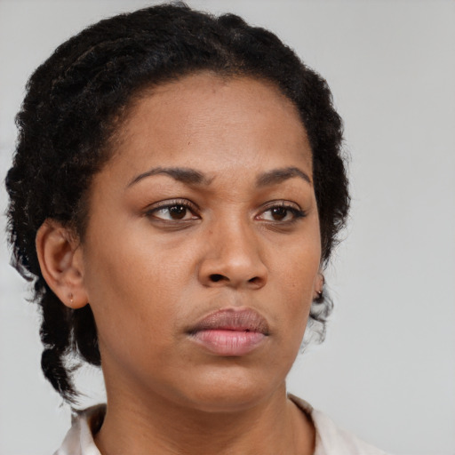 Neutral black young-adult female with short  brown hair and brown eyes