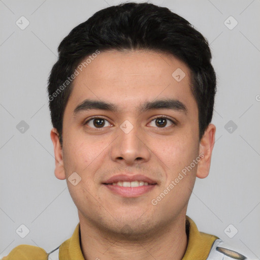 Joyful white young-adult male with short  black hair and brown eyes