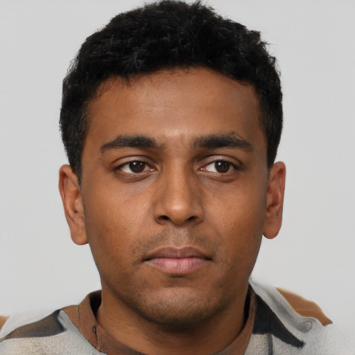 Neutral latino young-adult male with short  black hair and brown eyes