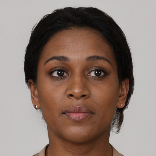 Neutral black young-adult female with short  brown hair and brown eyes