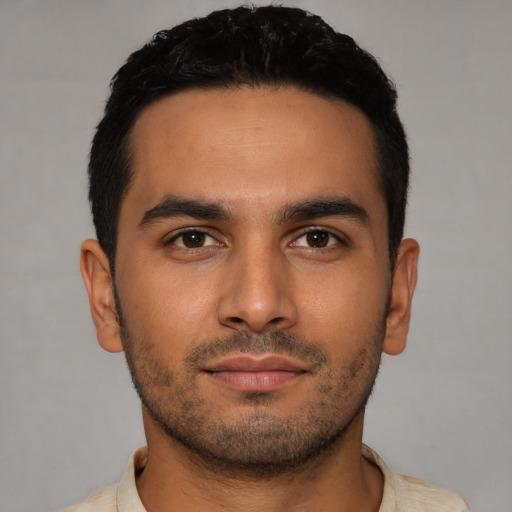 Neutral latino young-adult male with short  black hair and brown eyes