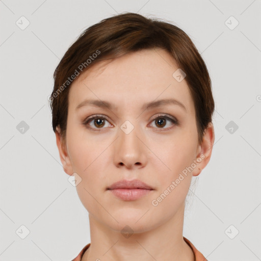 Neutral white young-adult female with short  brown hair and brown eyes