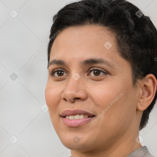 Joyful white adult female with short  brown hair and brown eyes