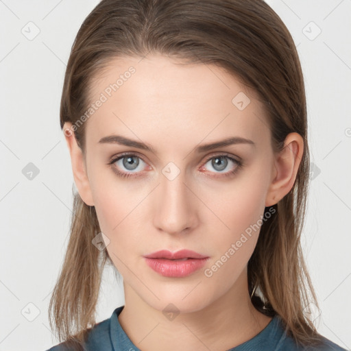 Neutral white young-adult female with medium  brown hair and grey eyes