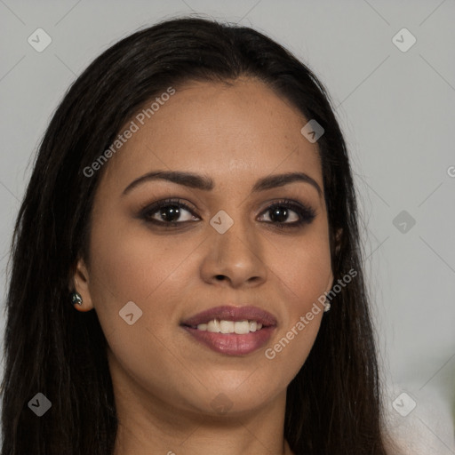 Joyful latino young-adult female with long  brown hair and brown eyes