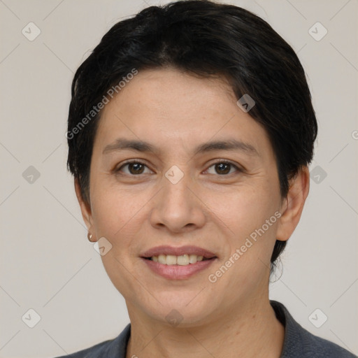 Joyful white adult female with short  brown hair and brown eyes