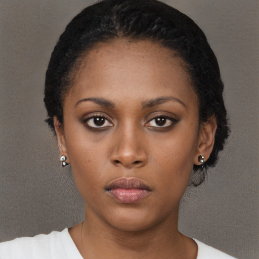 Neutral black young-adult female with short  black hair and brown eyes