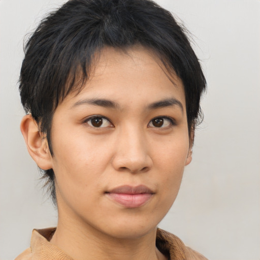 Joyful asian young-adult female with medium  brown hair and brown eyes