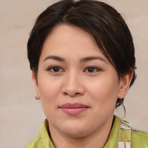 Joyful white young-adult female with medium  brown hair and brown eyes