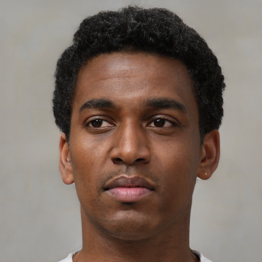 Neutral black young-adult male with short  black hair and brown eyes