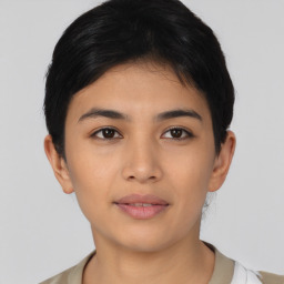 Joyful asian young-adult female with short  black hair and brown eyes