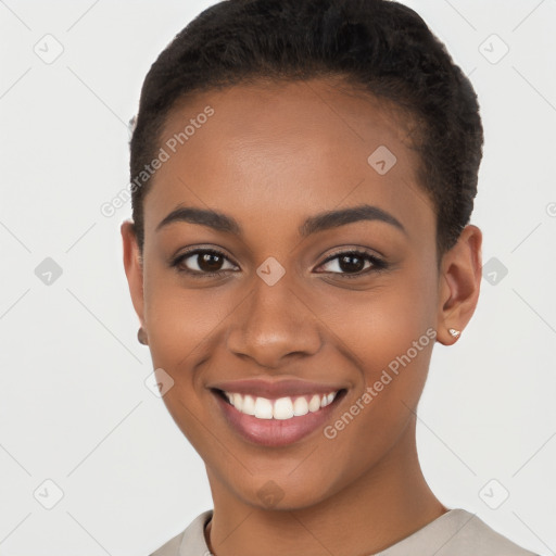 Joyful latino young-adult female with short  brown hair and brown eyes