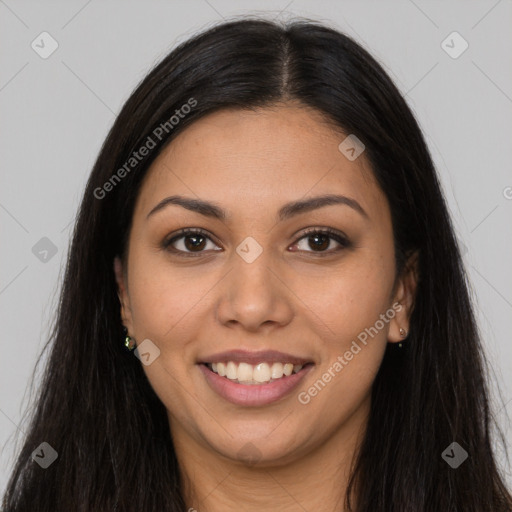 Joyful latino young-adult female with long  brown hair and brown eyes