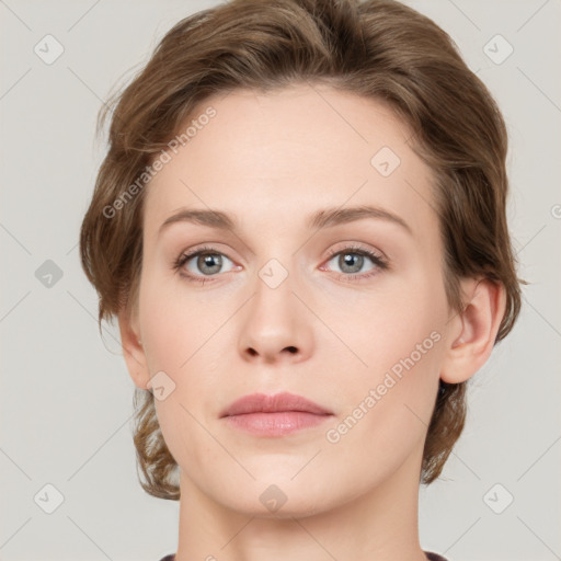 Neutral white young-adult female with medium  brown hair and green eyes