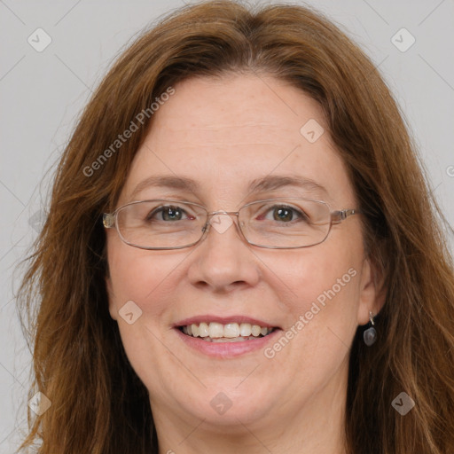 Joyful white adult female with long  brown hair and brown eyes