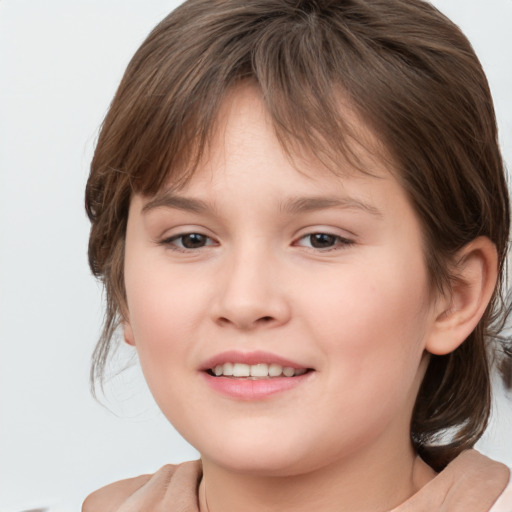 Joyful white child female with medium  brown hair and brown eyes