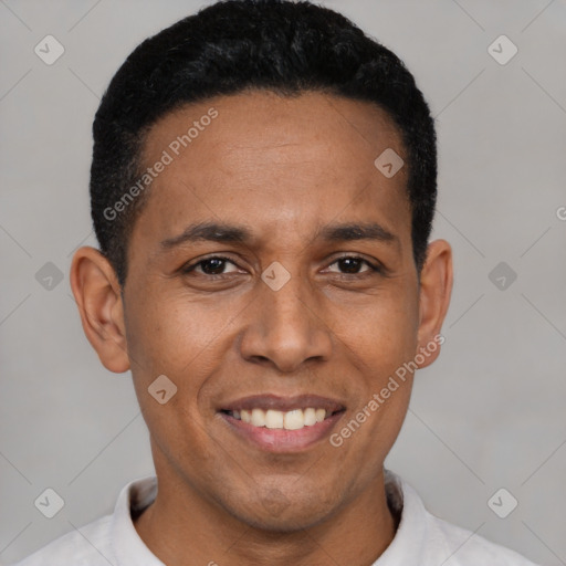 Joyful latino young-adult male with short  black hair and brown eyes