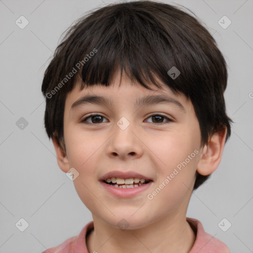 Joyful white child male with short  brown hair and brown eyes