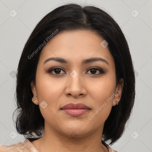 Joyful latino young-adult female with medium  brown hair and brown eyes