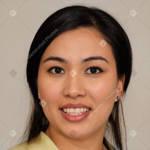 Joyful asian young-adult female with medium  black hair and brown eyes