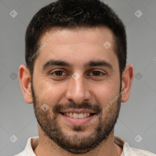 Joyful white young-adult male with short  brown hair and brown eyes