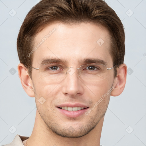 Joyful white young-adult male with short  brown hair and grey eyes