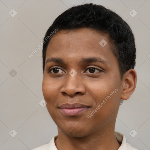 Joyful black young-adult male with short  black hair and brown eyes