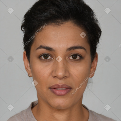 Joyful latino young-adult female with short  brown hair and brown eyes