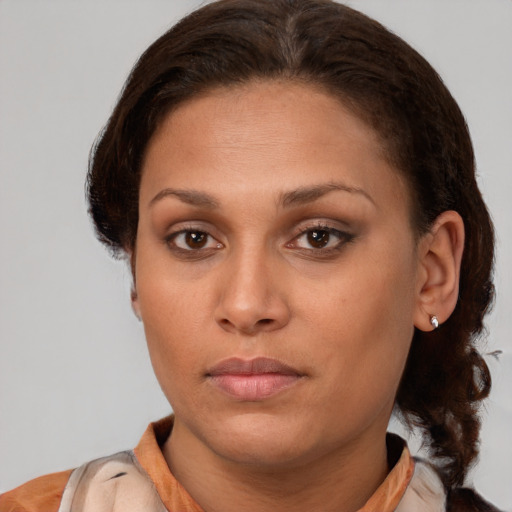 Neutral white young-adult female with medium  brown hair and brown eyes