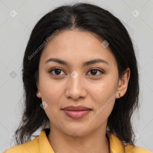 Joyful latino young-adult female with medium  brown hair and brown eyes